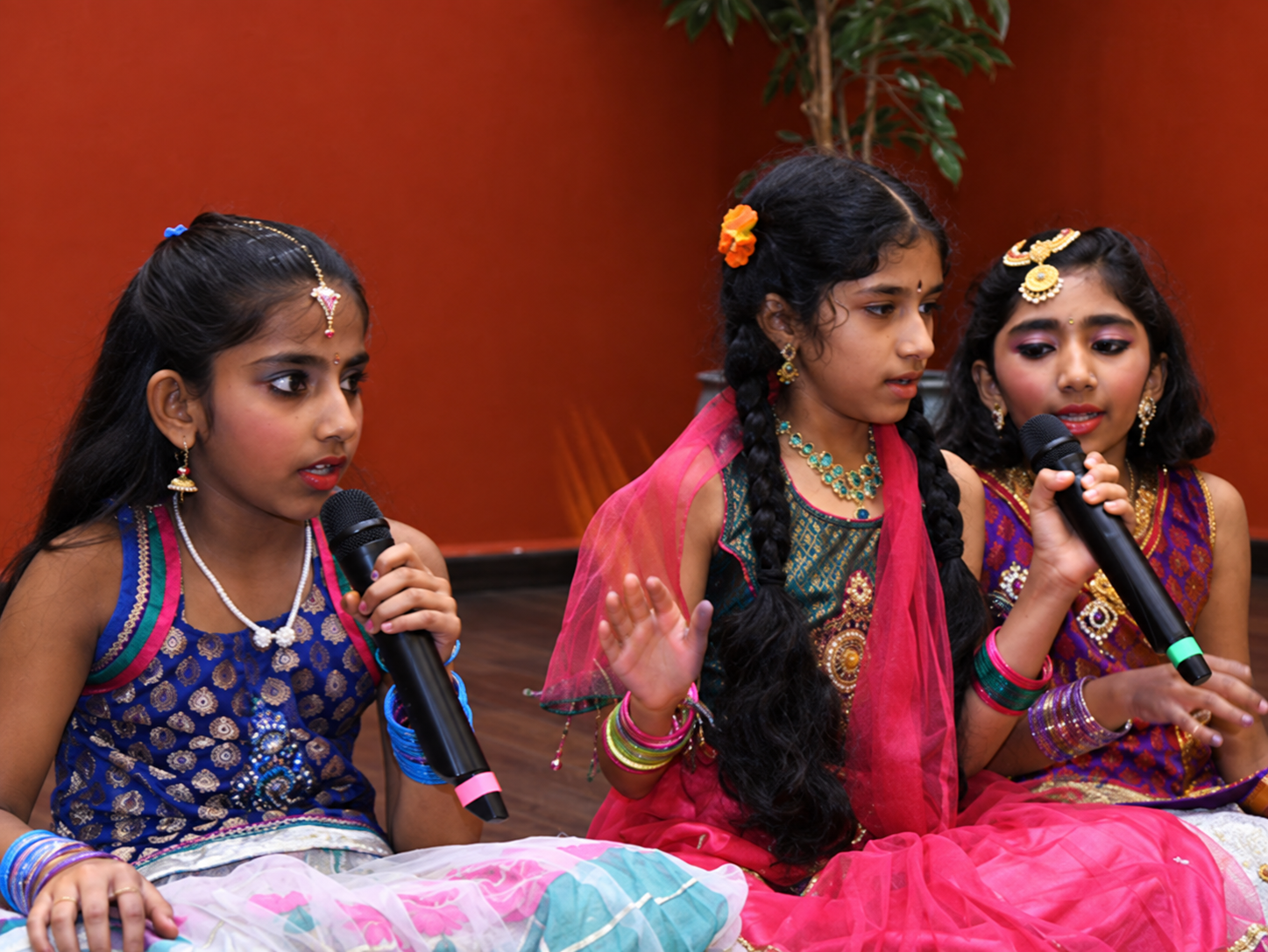 Students singing with microphones